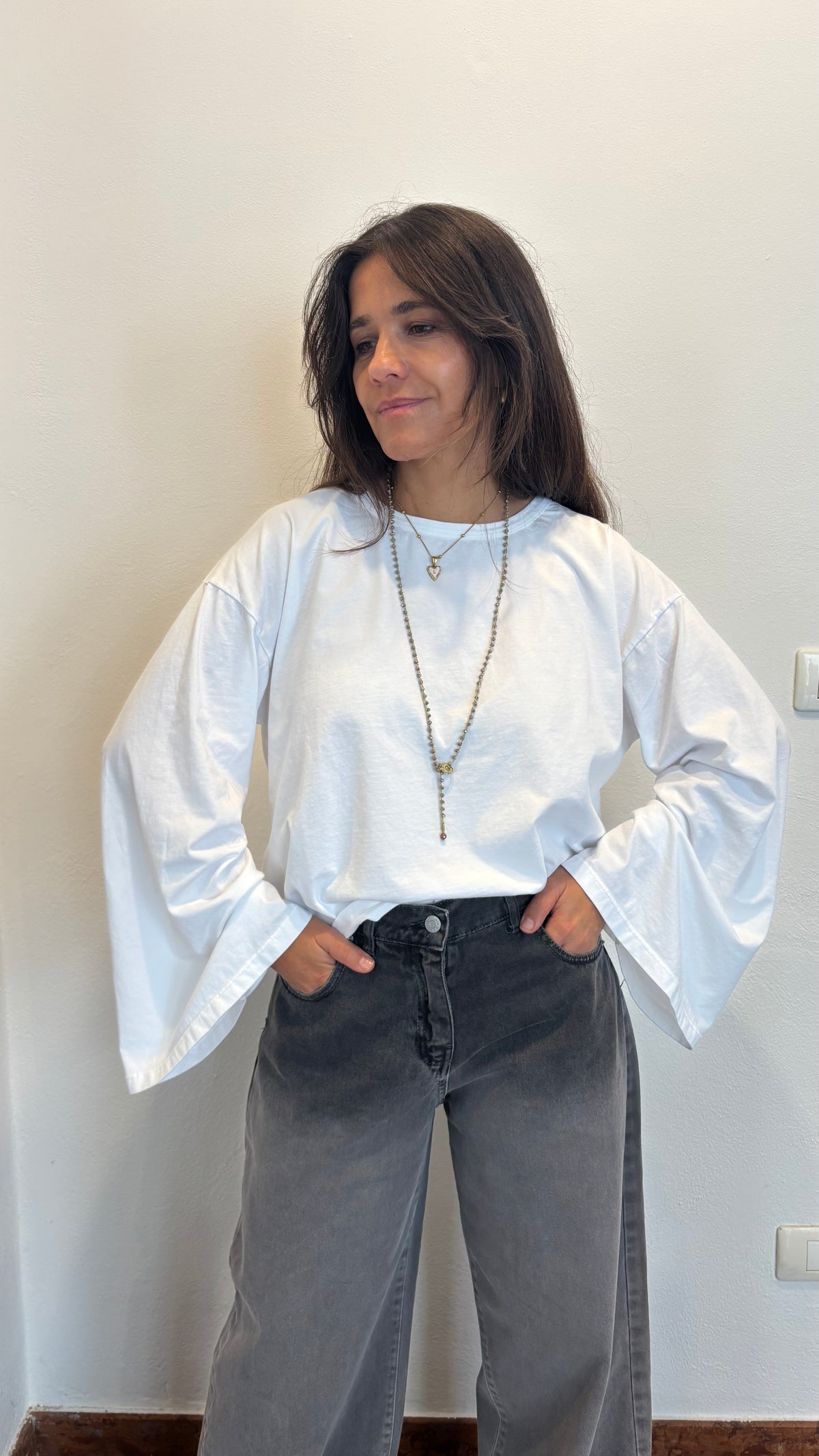 Maglia manica a trapezio